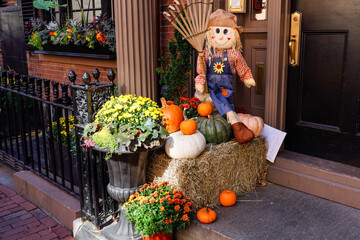 Boston, Massachusetts Halloween pumpkins on a porch on Beacon Hill.