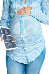 Happy pregnant girl lies on white background