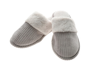 Pair of soft closed toe slippers on white background