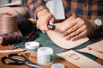 Man working with leather