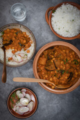 Lebanese chickpeas moussaka with chickpeas and aubergine, maghmour, served with rice,