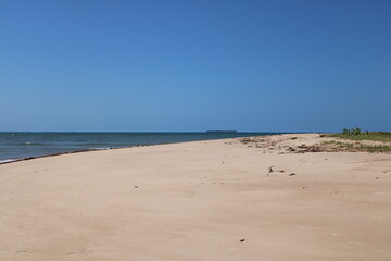 Fototapeta na wymiar Sunny day in a Desert Beach in Brazil