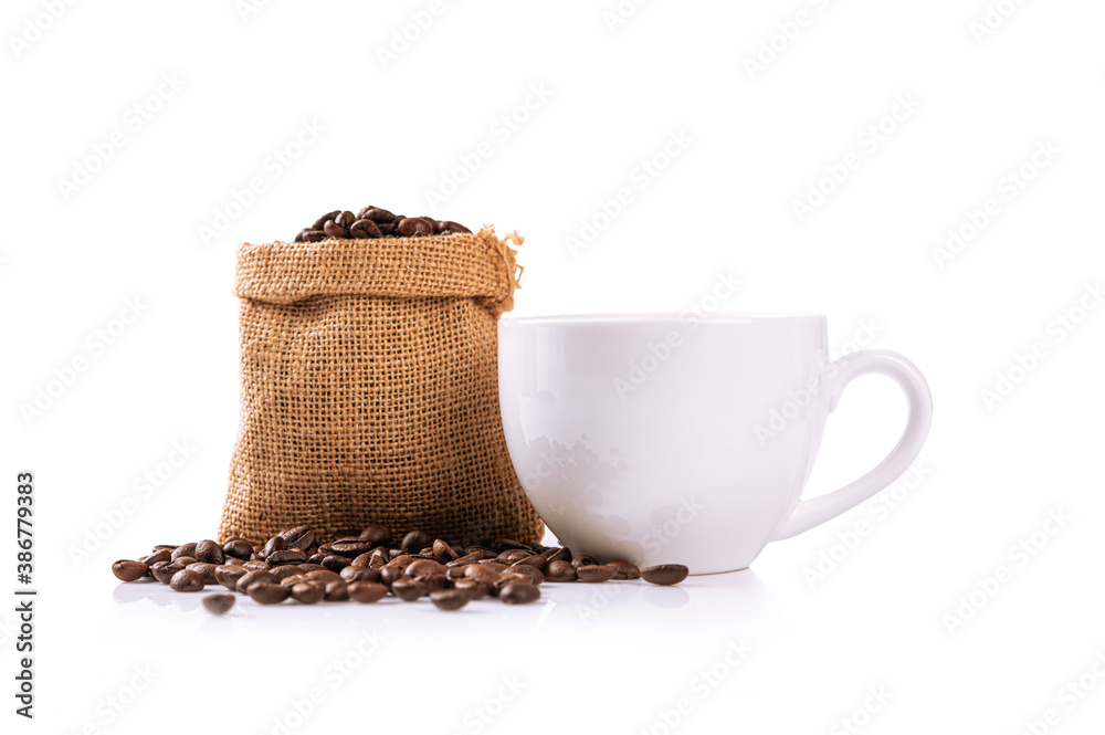 Wall mural cup of coffee with beans isolated on white background.