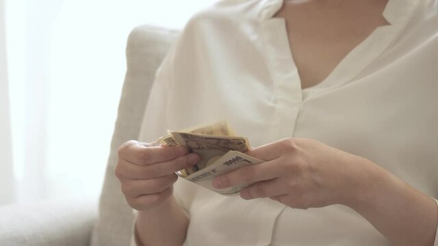 日本円を数える人