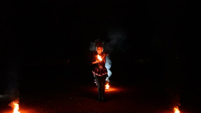 Girl dances with burning torches, hd stock footage