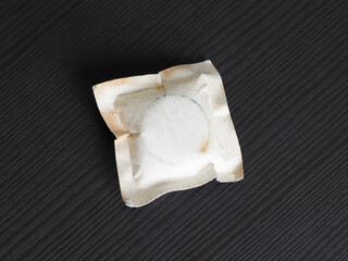 Expired tablet medicine on wooden background.