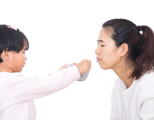 Daughter is helping mother put on mask during infectious disease