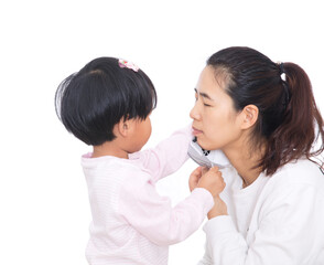 Daughter is helping mother put on mask during infectious disease