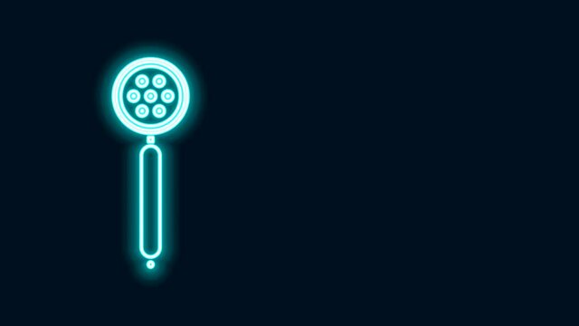 Glowing neon line Strainer spoon icon isolated on black background. 4K Video motion graphic animation