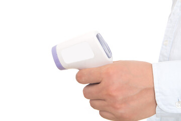 Shooting hands holding infrared thermometer in front of white background