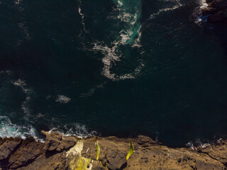 Aerial views of amazing rocks in the ocean. Wallpaper design. Fantastic landscape. Beauty of nature concept.