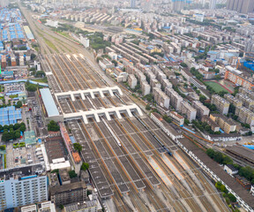aerial view of the city and train station and high speed train