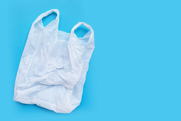 White plastic bag on blue background.