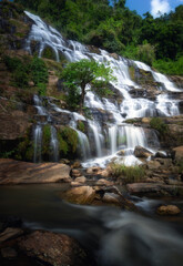 Naklejka na ściany i meble Mae Ya Waterfall, the most beautiful waterfall in Thailand At Doi Inthanon National Park, which is a famous beautiful stream in Thailand