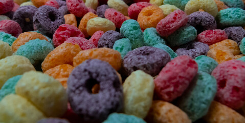 many colored cereals in the shape of a wheel