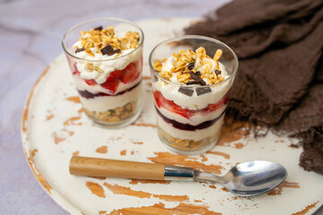 Dessert Parfait glass cup, with lemon jello, yogurt and fresh strawberries. 
