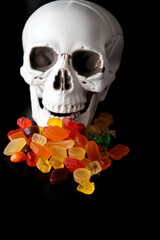 Skeleton Skull with Candy to eat during Halloween