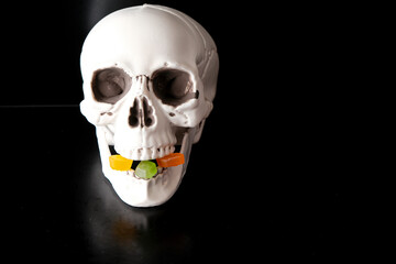 Skeleton Skull with Candy to eat during Halloween