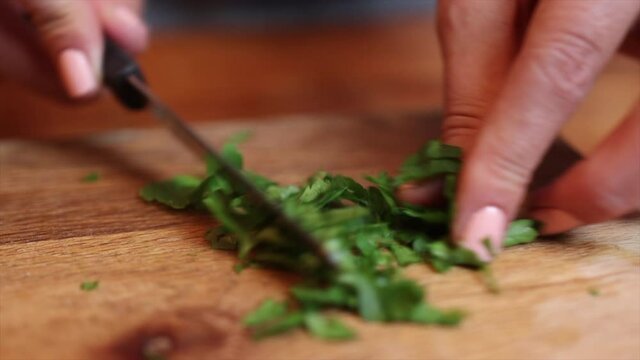 White Chef Chopping Corriander Her