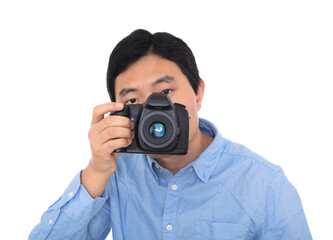 Male photographer holding a camera to take pictures in front of white background