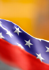 US flag on yellow background. Background for creating a postcard or invitation card. Vertical photo.