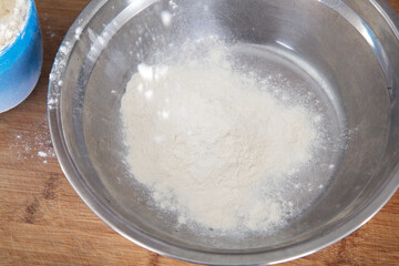 White flour in a steel basin
