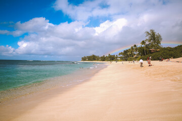 Rainbow at Sunset Beach, North shore, Oahu, Hawaii
