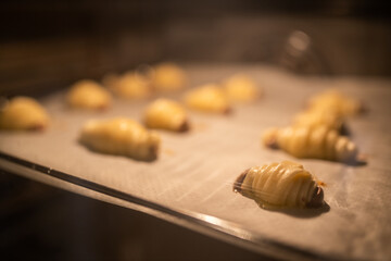 homemade croissants being made in the oven