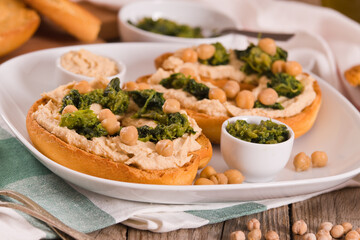 Friselle with turnip tops and hummus.