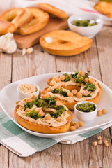 Friselle with turnip tops and hummus.
