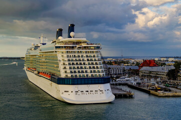 Modern luxury cruiseship or cruise ship liner sail away departure from Key West, Florida during...