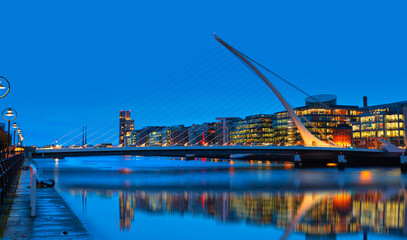 Samuel Backett Bridge (Harp Bridge) at twilight blue hour - River Liffey, Dublin  Ireland 