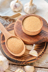 Aromatic powdered garlic on table