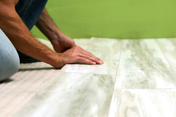 Fototapeta na wymiar laminate flooring concept close up