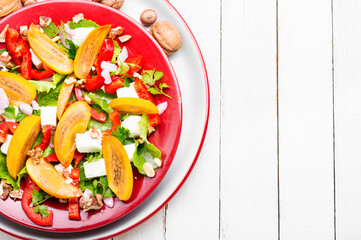 Salad with persimmon