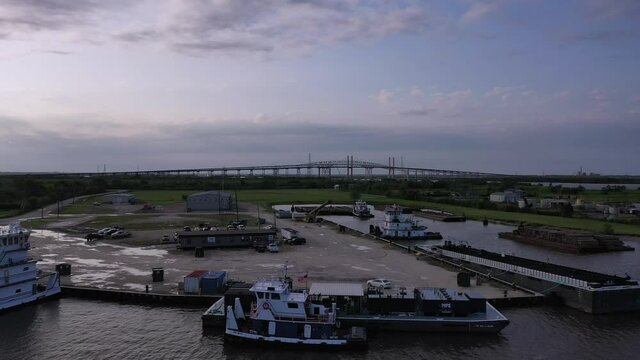 Huge bridge near a shipping channel in Bridge City Texas at Sunset