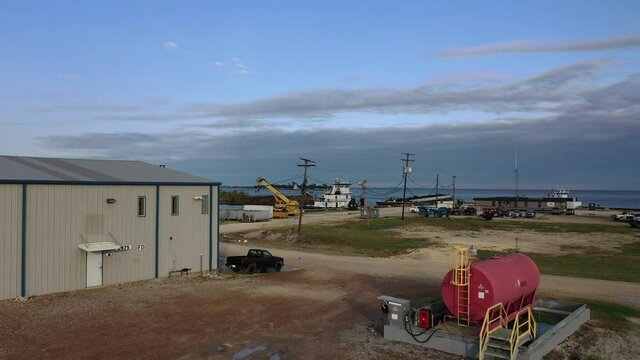 Tug boat/Push boats and barges docked hear Bridge City Texas near Sabine Lake.