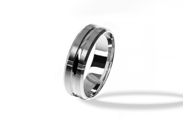 Golden wedding ring on a white background.