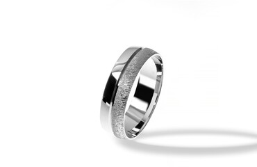 Golden wedding ring on a white background.