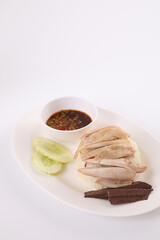 Thai food gourmet steamed chicken with rice , khao mun kai in wood background