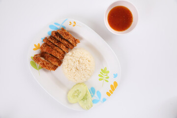 Thai food gourmet fried chicken with rice , khao mun kai in wood background