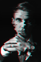 Black and white portrait of a man with glitch effect