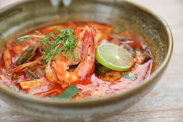 Tom Yum soup , a Thai traditional spicy prawn soup