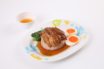 stewed pork leg with rice local Thai food street food isolated in white background