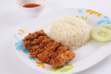 Thai food gourmet fried chicken with rice , khao mun kai in wood background
