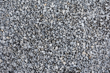 Texture of gray broken stone or rubble as a natural background.