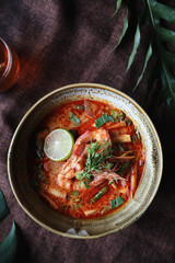 Tom Yum soup , a Thai traditional spicy prawn soup