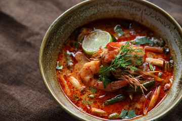 Tom Yum soup , a Thai traditional spicy prawn soup
