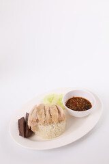 Thai food gourmet steamed chicken with rice , khao mun kai in wood background