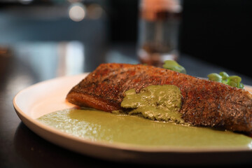 Sea bass fillet with pesto sauce